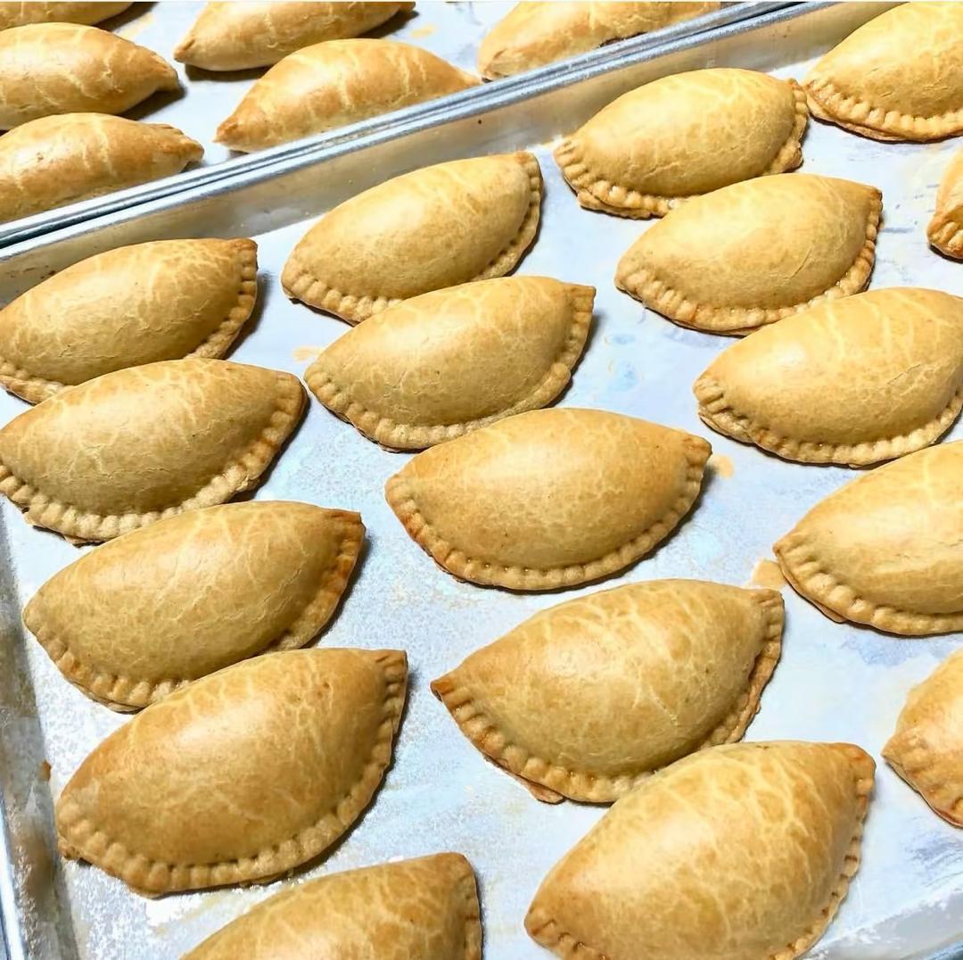 Tray of freshly baked meat pies